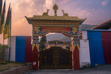 Morning view to the gate of Tibetan monastery with magical sunrise atmosphere near Pokhara, Nepal. © Tadeas