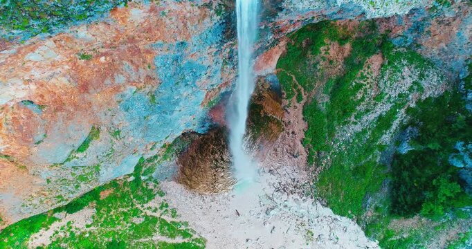 Aerial close view of waterfall stream