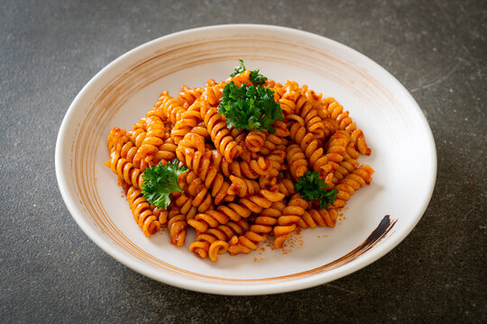 spirali or spiral pasta with tomato sauce