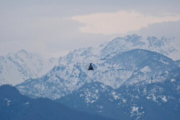 Helicopter Flying Over Snow-Capped Caucasus Mountains in Winter, Georgia