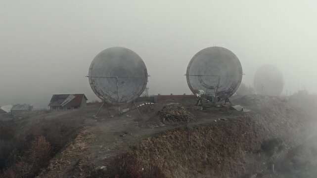 Abandoned Cold War Communication Station in the Fog