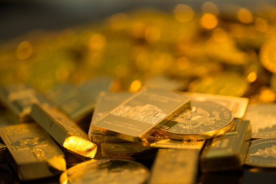 Gold Coins and Bullion Bars Close-Up