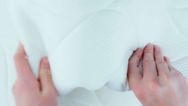 A close look at various mattresses placed side by side. The focus is on how each mattress looks and what it offers for sleep comfort