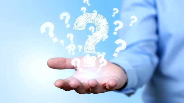 Hand holding a glowing question mark, symbolizing inquiry, problem-solving, and seeking answers in a business context.