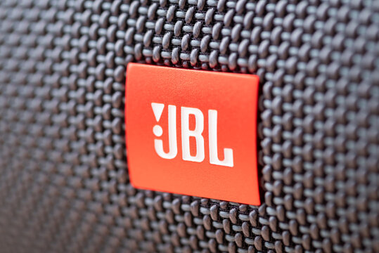 Chernihiv, Ukraine - September 23, 2023: JBL logo in close view with textured surface and bright color reflecting sound technology and design features