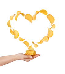 Flying potato chips over female hand on a white background