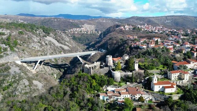 Combining history and modernity: Trsat Castle overlooks the Rjecina Valley, with the impressive Rjecina Viaduct spanning the gorge. A stunning aerial view of Rijeka, Croatia.