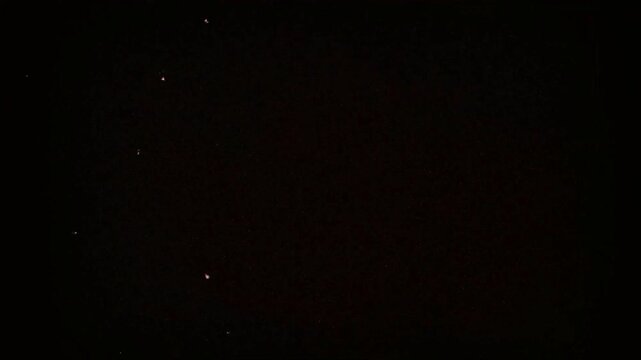 Realistic analog punch hole film effect with damaged celluloid texture, organic grain, and burn light leaks, ideal for nostalgic video transitions and creative edits.