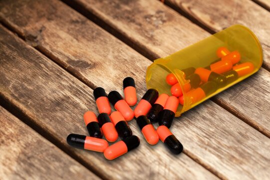 Plastic bottle on a with pills, healthy diet concept