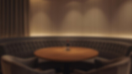 Obraz premium Blurred dark dining room background with round table and curved banquet seating