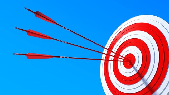 Three red arrows hitting the center of a target, concept of success and achievement. Concept for business success, goals, accuracy, and leadership.