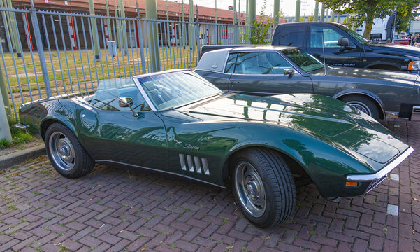 American corvette stingray sports car parked on the street