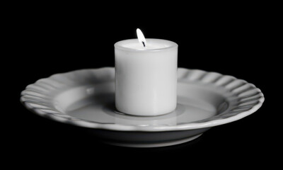 The Aftermath of Dinner: Candle Drip Hardened on a Plate