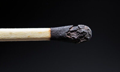 Spent Energy: A Broken Matchstick and Pile of Ash