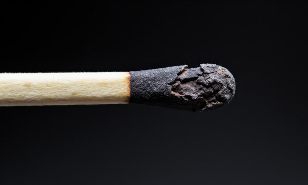 Spent Energy: A Broken Matchstick and Pile of Ash