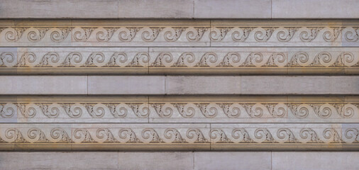 Elements of architectural decorations of buildings, columns and capitals, gypsum moldings, wall textures and patterns. On the streets in Barcelona, public places. © Kozlik_mozlik