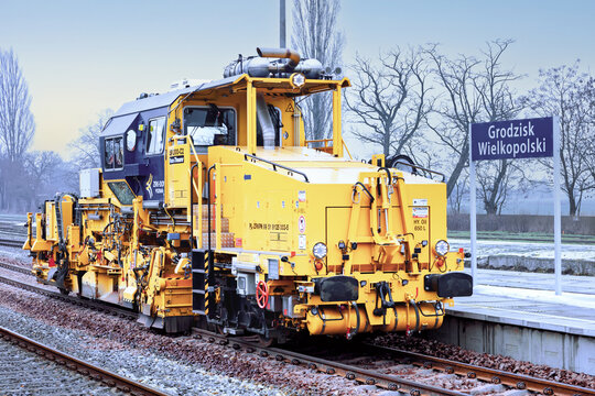 Grodzisk Wielkopolski, Poland - February 10, 2026. A Plasser and Theurer railway track maintenance machine.