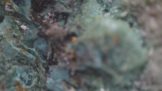 Macro crystall of gibbsite from Copper Mountain, Utah, captured via microscope objective, 2.4&times; magnification, 15 mm field of view. Fibrous and botryoidal texture