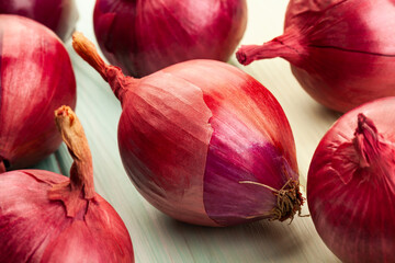 red onion on wood background