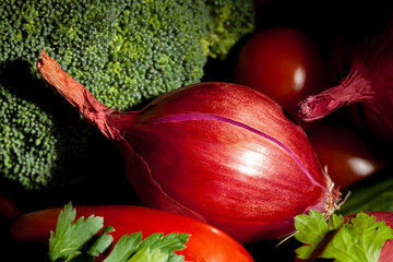 red onion vegetable mix on black background