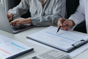 Accountant assessing numbers in office for precise valuation documents