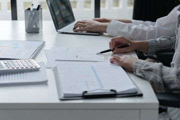 Accountant assessing numbers in office for precise valuation documents