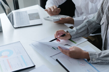 Accountant assessing numbers in office for precise valuation documents