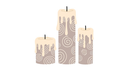 Three candles with swirl designs stand upright on a white surface viewed from a slightly elevated angle © Steven