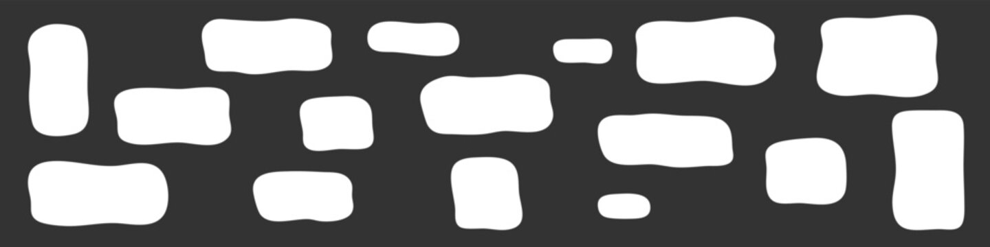 Abstract set of irregular white hand-drawn stone shapes on a dark background. Minimalist cobblestone or wall pattern elements for graphic design.