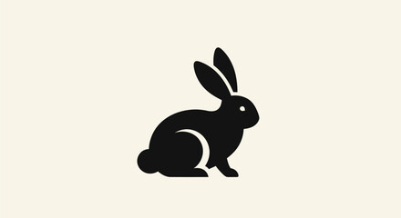 Obraz premium Black rabbit silhouette on cream background