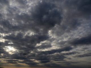 Obraz premium Dark and dramatic cloudy sky with god rays. Background for design.