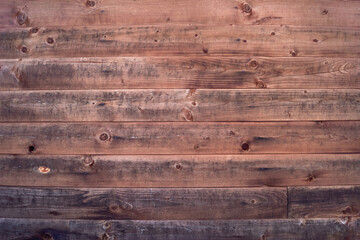 Obraz premium Horizontal wooden planks background with warm tones and faded bottom detail, natural wood surface