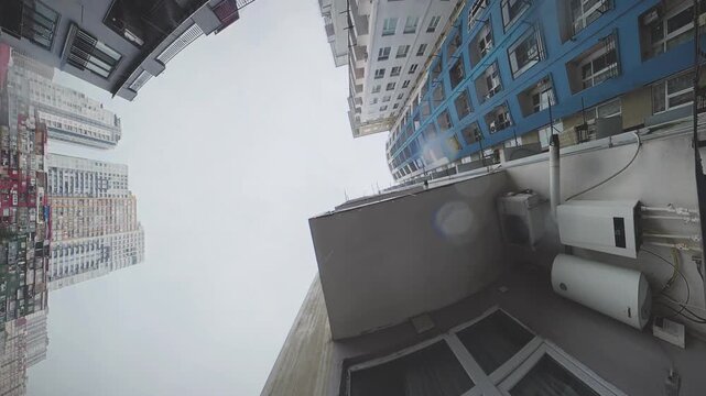 Rainy Urban View of Old and New Apartment Buildings