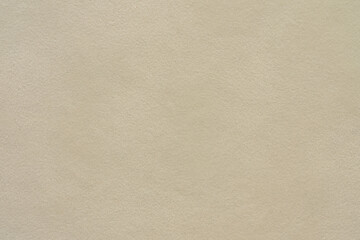 Beige suede leather texture background, natural soft fabric surface