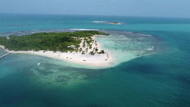 Aerial view of calm tropical waters and coastal vegetation. Serenity and nature background.