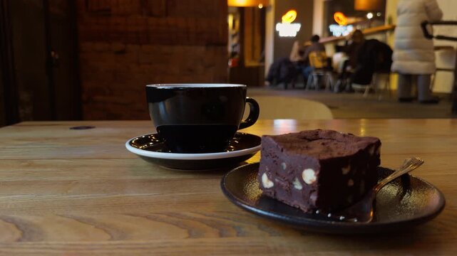 Coffee with sweet accompaniments. Rustic table hosts coffee and dessert setup