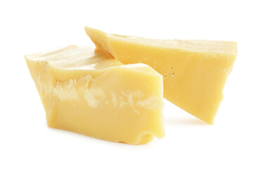 Pieces of natural cocoa butter isolated on white