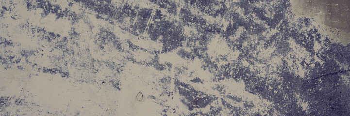 Texture of old concrete wall. Rough gray concrete surface with white spots. Wide panoramic background for design.