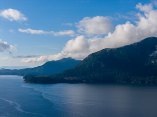 Majestic Mountain Coast Over Howe Sound, BC: Serene Water, Forested Peaks, Clear Sky