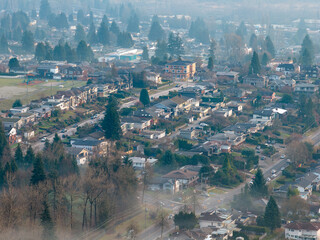 Obraz premium Aerial View Of Suburban Burnaby Neighborhood In Misty Morning Light, Canada