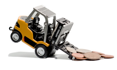 oy Forklift Tipping Over Under the Weight of British Coins  Concept for Financial Risk, Business Debt, and Economic Inflation. © James