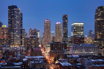 Naklejka premium The modern Jersey City skyline during blue hour.