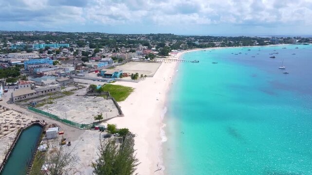 Brownes Beach aerial view at Carlisle Bay in city of Bridgetown, Saint Michael, Barbados. This coast belongs to Bridgetown and Garrison UNESCO World Heritage Site. 