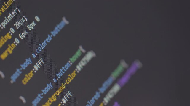Close-Up Of Colorful Computer Code On A Dark Screen Highlighting Software Development In A Modern Tech Environment