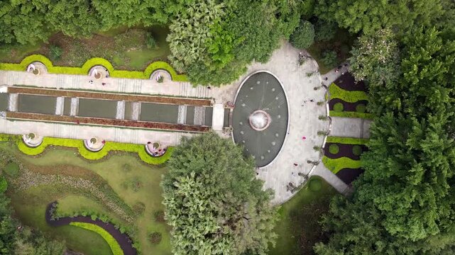 Aerial View of Formal Garden with Oval Fountain and Manicured Hedges
