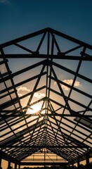 Greenhouse Glass Roof Structure at Sunset.