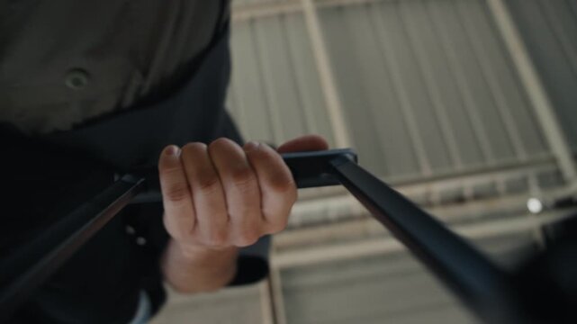 Traveler pulling luggage through airport terminal