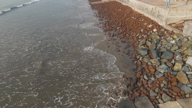 Aerial drone view of Mandarmani sea beach during low tide