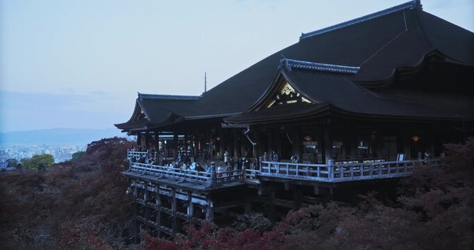 Majestic 8th century Kiyomizu-dera temple at dusk during autumn season