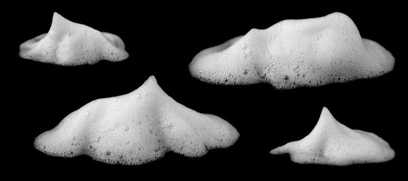 White soap foam bubbles isolated on black background, realistic cleaning suds texture, detergent and hygiene concept, abstract foam overlay for cosmetic, cleaning product design and visual effects.